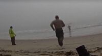 LA deputies caught on camera racing into foggy ocean to rescue disoriented paragliders