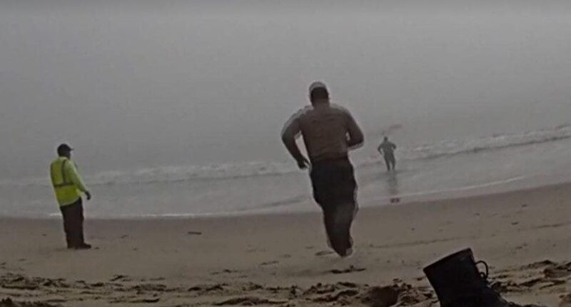 LA deputies caught on camera racing into foggy ocean to rescue disoriented paragliders