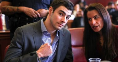 Luigi Mangione pumps fist in court as body cam allegedly reveals loaded magazine found inside wet underwear