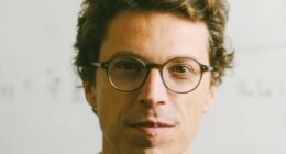 MIT professor was shot dead in HALLWAY as neighbors describe horror