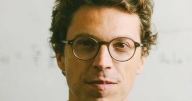 MIT professor was shot dead in HALLWAY as neighbors describe horror