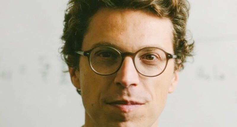 MIT professor was shot dead in HALLWAY as neighbors describe horror