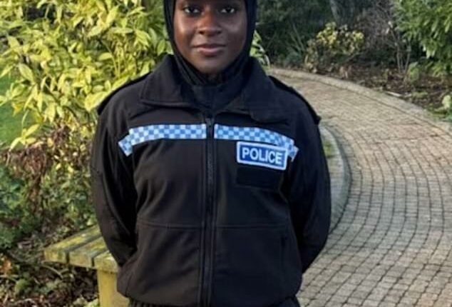 Magnetic hijabs could be rolled out across police forces in an effort to attract more female Muslim recruits. Pictured: PC Hafsah Abba-Gana models the new design