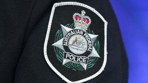 Man charged over alleged antisemitic threats on flight from Bali to Sydney