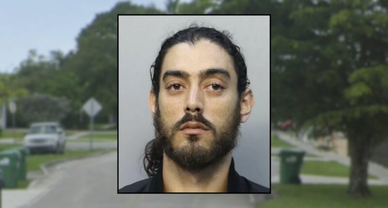 Man threatened woman as she backed into her driveway: Cops