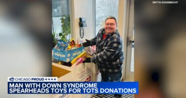 Man with Down syndrome saves all year to donate to South Elgin Fire District Toys for Tots campaign