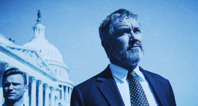 Congressman Thomas Massie standing thoughtfully in front of the U.S. Capitol building, with a blue-toned, halftone filter evoking a dramatic, cinematic style.