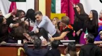 Mexican lawmakers filmed pulling hair and shoving each other during heated Congress floor debate
