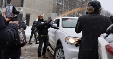 Minneapolis police chief blasts ICE after agent seen dragging woman through street, kneeling on her back