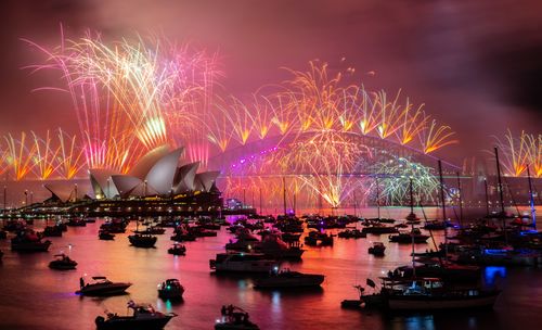 Sydney NYE 2024. HIGH RES. The midnight New Year's Eve fireworks on Sydney Harbour, viewed from Mrs Macquaries Chair. 31 December 2024. Photo: Wolter Peeters, The Sydney Morning Herald.