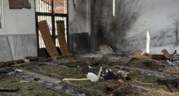 In this photo released by the Syrian official news agency SANA, damage is seen after an explosion hit the Imam Ali bin Abi Talib Mosque in the Wadi al-Dahab neighborhood of Homs, Syria, Friday, Dec. 26, 2025. (SANA via AP)