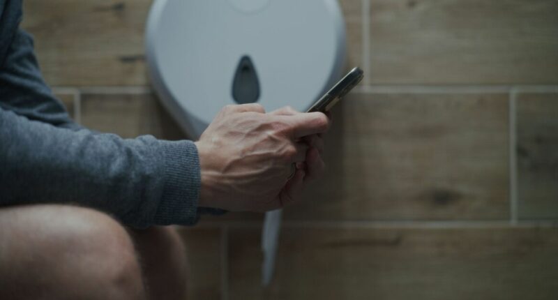 NHS doctor urges people to never use phone on toilet for surprising reason