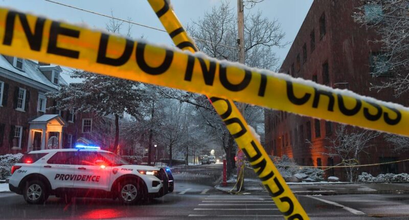 New videos and photos released of Brown University shooting person of interest as manhunt continues