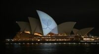 Opera House lit up in 'powerful message' to the world after Bondi attack