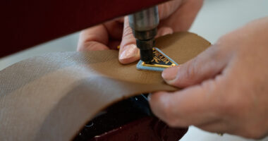 Prada Group says it has purchased fashion rival Versace in a deal worth nearly $1.4 billion