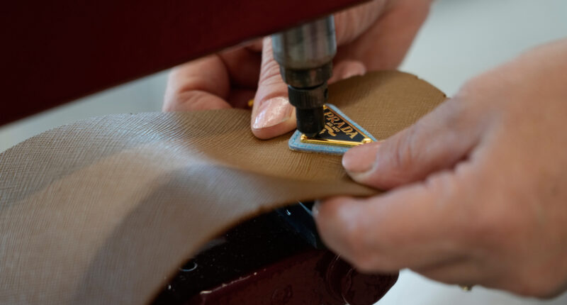 Prada Group says it has purchased fashion rival Versace in a deal worth nearly $1.4 billion