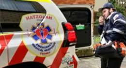 Rabbi Yanky Super using his emergency services radio