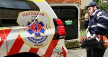 Rabbi Yanky Super using his emergency services radio