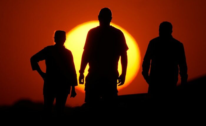 Researchers slightly lower study's estimate of drop in global income due to climate change