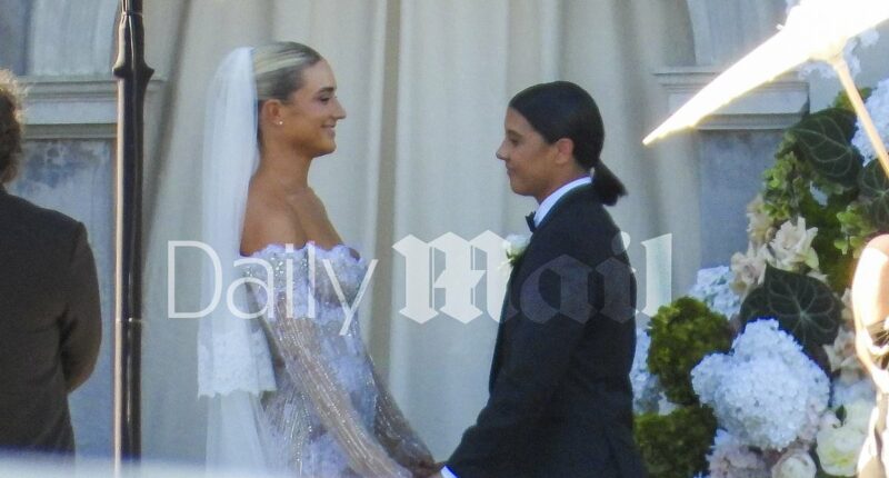 Sam Kerr and Kristie Mewis tie the knot in Aussie sport's wedding of the year as Matildas stars stun in all-black outfits