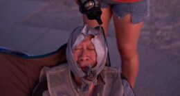 FILE - Grace Chyuwei pours water on Joe Chyuwei to help with the heat Aug. 3, 2025, in Death Valley National Park, Calif. (AP Photo/John Locher, File)