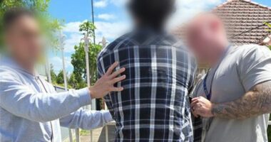 Six men arrested after loaded guns found in car were 'contract killers', police say