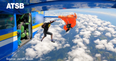 The pilot was initially unaware a skydiver had become caught on the plane in Tully, Queensland, according to the ATSB final report.