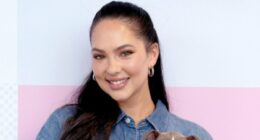 Sports Illustrated Swimsuit vet Christen Harper Goff snuggles puppies