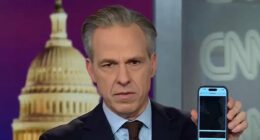 Stunned Jake Tapper scrolls through redactions in Epstein files on air