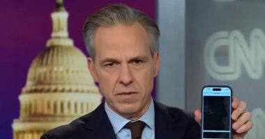 Stunned Jake Tapper scrolls through redactions in Epstein files on air
