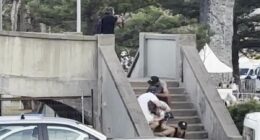 Stunning new video shows family hiding a metre from Bondi gunman