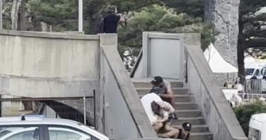 Stunning new video shows family hiding a metre from Bondi gunman