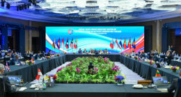 Thailand bombs a village in Cambodia even as both nations hold border talks to end armed clashes