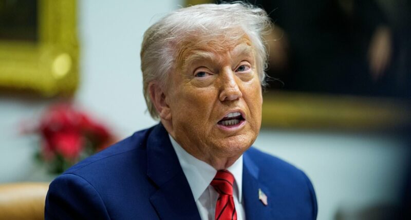 Trump rages 'corrupt' CNN must be sold in fiery clash with reporter