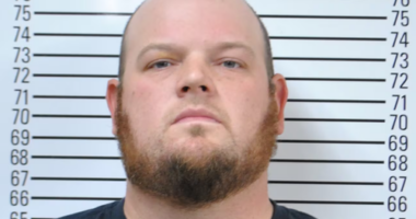 US man shooting gun in yard kills woman blocks away, police say