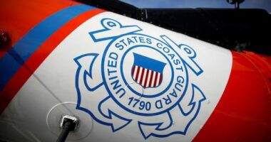 FILE PHOTO: The U.S. Coast Guard's logo is seen on an helicopter on the deck of the Coast Guard Cutter Hamilton at Port Everglades, in Fort Lauderdale, Florida, U.S. November 22, 2021. REUTERS/Marco Bello/File Photo