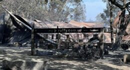 A major bushfire that has desï»¿troyed homes and left three people missing in central Victoria has created scenes that a local firefighter has likened to an "atomic bomb".