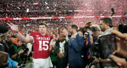 Indiana completes undefeated season and wins first national title, beating Miami 27-21 in CFP final