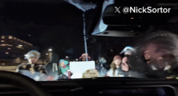 Anti-ICE agitators swarm vehicle of conservative influencer Nick Sortor