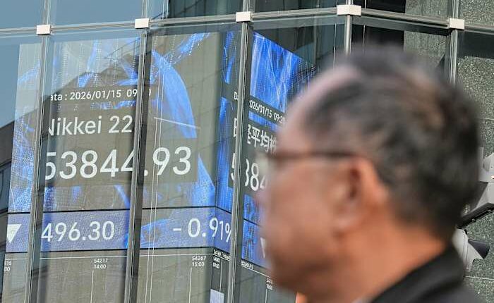 Asian shares, US futures gain as Japan keeps its key interest rate unchanged