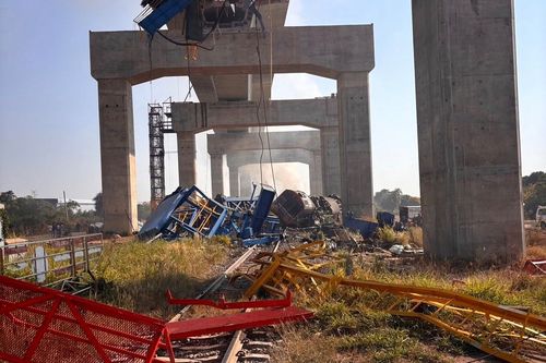 This photo released from State Railway of Thailand, shows a scene after a construction crane fell into a passenger train in Nakhon Ratchasima province, Thailand Wednesday, Jan. 14, 2026. (State Railway of Thailand via AP)