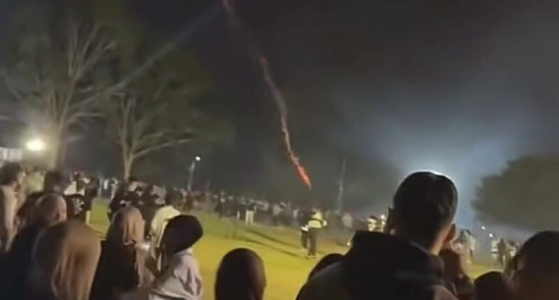 Aussies scream in terror as rogue fireworks misfire into the crowd