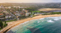 Panoramic drone aerial view over Dee Why beach and Dee Why lagoon, Northern Beaches Sydney NSW Australia