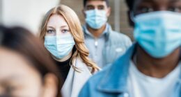 Brits urged to 'mask up' as 'super flu' cases explode across the UK