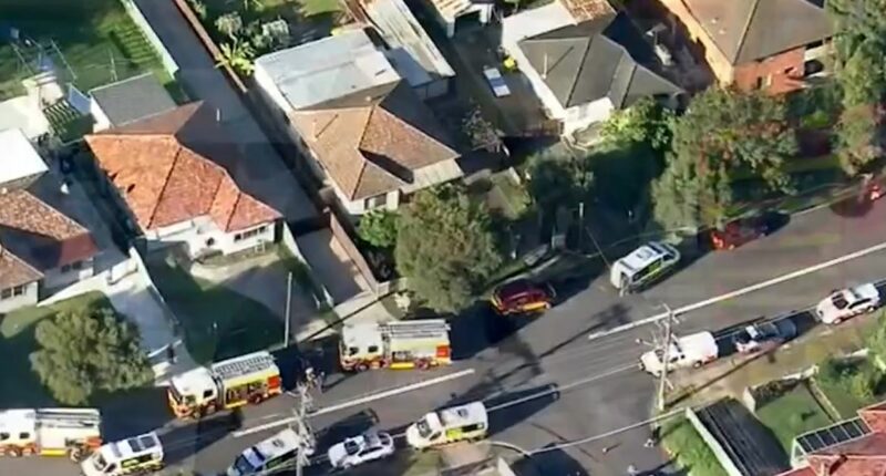 Carer charged over fatal house fire