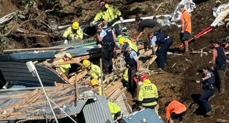 A woman who warned others of a landslide just moments before she was buried in rubble is being hailed a hero as desperate search efforts continue. Multiple children are among those unaccounted for after a big landslide destroyed the popular Mount Maunganui Beachside Holiday Park on New Zealand's North Island. The woman is being praised by locals after she frantically pulled campers from their beds at 5am and warned them of danger so they could start packing up to leave. In a tragic twist, the same woman later became trapped in a toilet block along with several others when the hillside completely collapsed a few hours later, at about 9.30am on Thursday. The amenities block was buried in the landslip, with rescuers hearing terrified screams for help, but being unable to hear further cries after about 15 minutes. 'I just want you to know that one of the women that's in that shower block, she was a hero,' a witness, who didn't want to be named, told the New Zealand Herald. 'She went around at 5 o'clock this morning and she got us all out of bed and she woke us all up so that we could move out... and she's not out.'