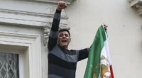 Dissidents remove Iranian flag from embassy as thousands protest in UK