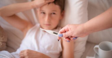 Doctors reveal key 'super flu' symptoms to watch for... as new strain leaves sufferers gasping for air and needing machines to breath