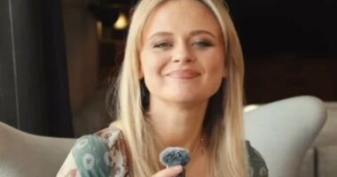 Emily Atack shows off her dramatic body transformation in a plunging midi dress as she films a new video opening about parenting