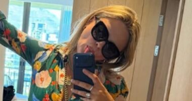 Emily Atack's dramatic transformation continues as she shows off her tummy in a cropped shirt and shorts